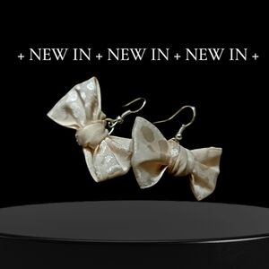 Elegant Cream Bow Earrings